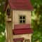 Glitzhome® 14.25" Yellow Washed Distressed Wood Cottage Birdhouse